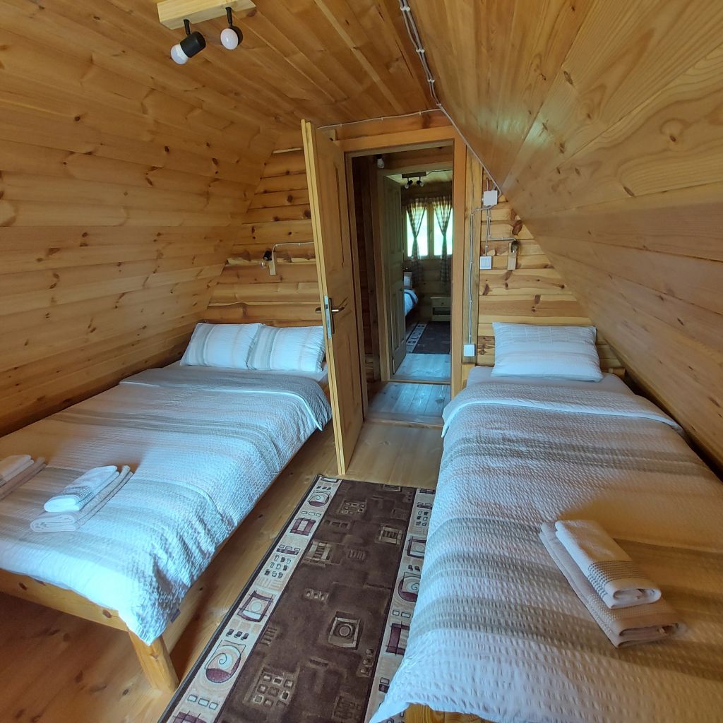 Out of two bedrooms in each cabin, one has a view over the lake