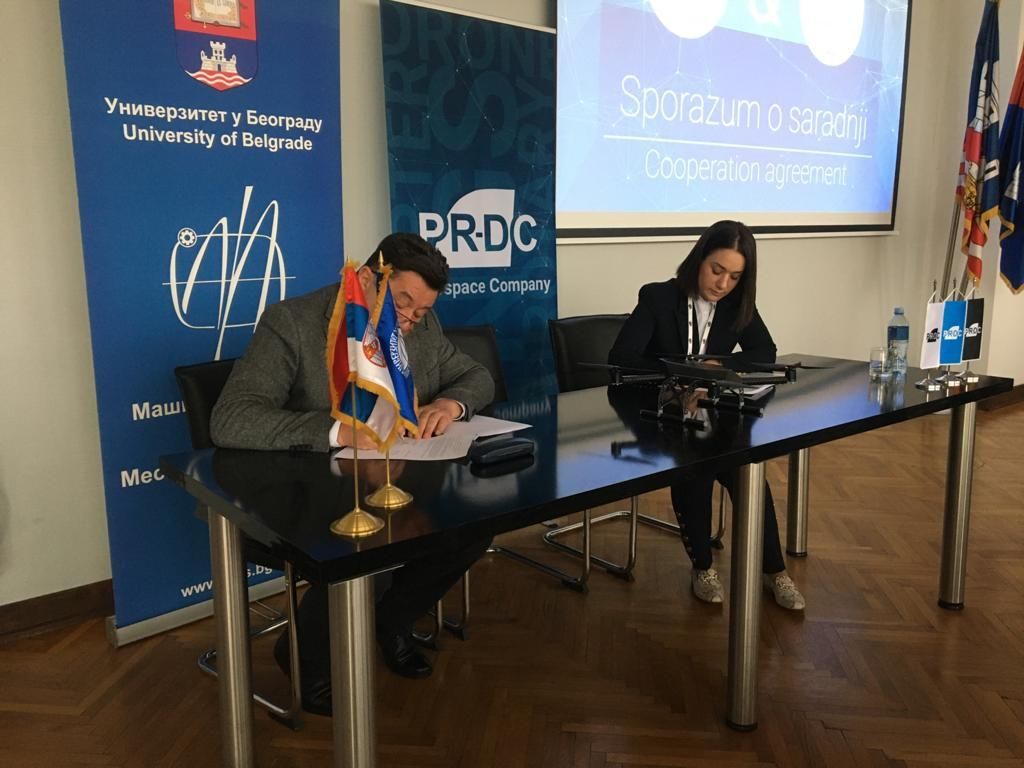 Director Tijana Petrasinovic Mileta signing the cooperation agreement on behalf of PR-DC