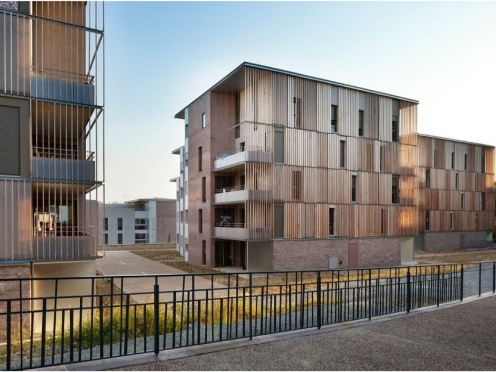 Example illustrating the materialization and colors of the residential facilities – the facades are dominated by wood, concrete and steel with plenty of glass surfaces